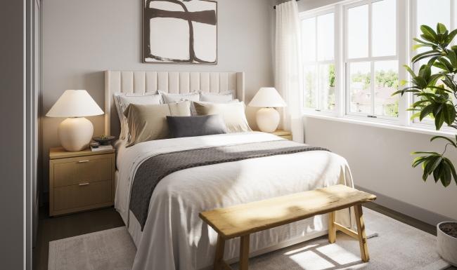 a bedroom with a bed and a bench